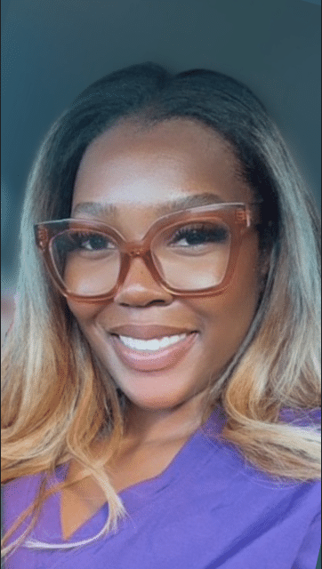 Smiling photo of Black female