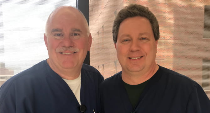 Nurse Michael Lovelace (left) and critical care nurse Ken Harris (right). Photo courtesy of Michael Lovelace