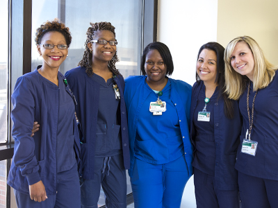 Group photo of nurses in blue scrubs from the UAB Outpatient Clinical Decision Unit (OCDU)