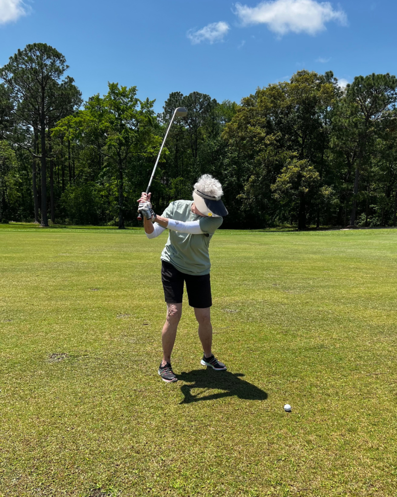 Sarah Hazen golfing