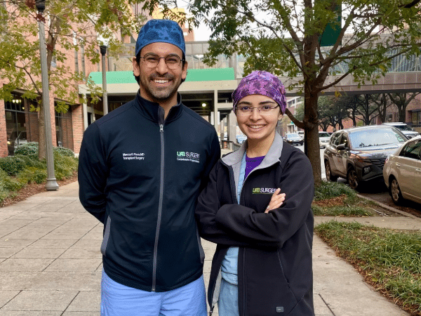 Marcos Pozo Jatem, M.D. standing next to Saulat Sheikh, M.B.B.S., outside