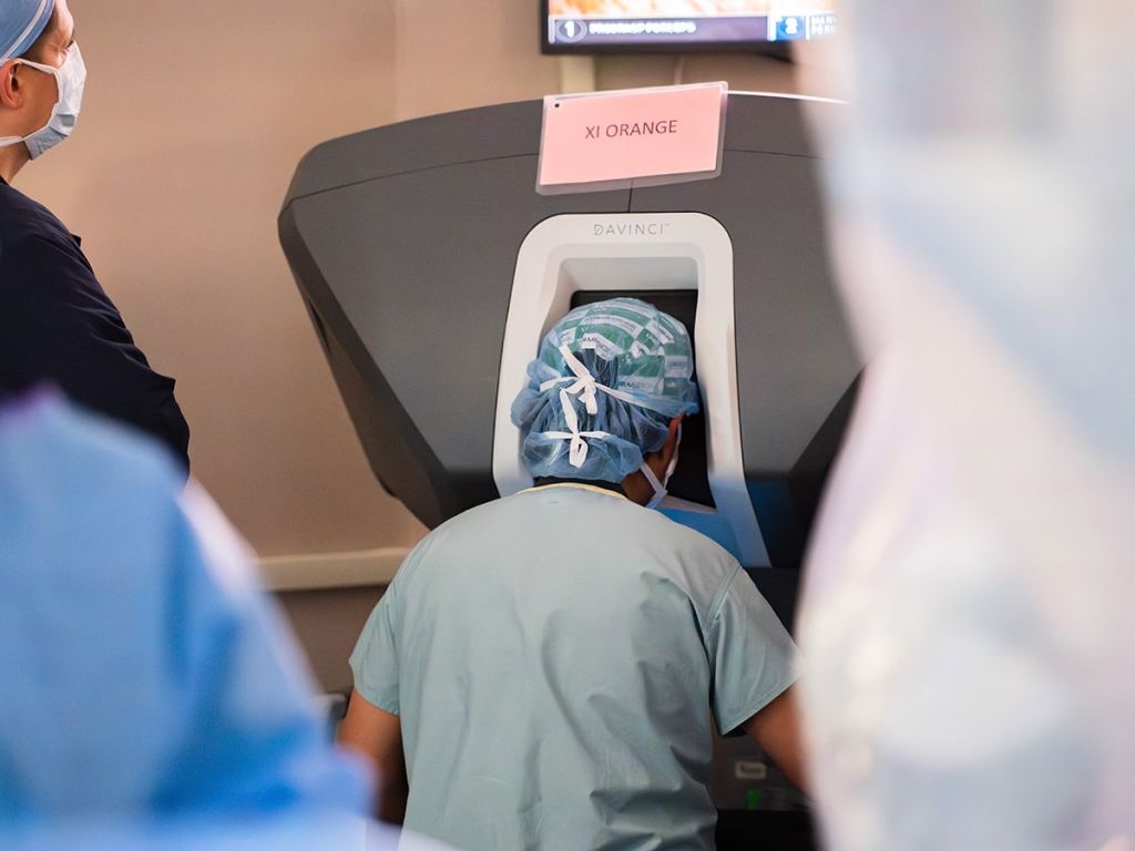 Muhammad Rabbani, M.D. operates a robotic surgical device during UAB's first robotic kidney transplant.