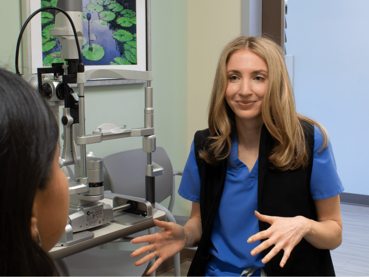 Dr. Erin McGahey meeting with a patient