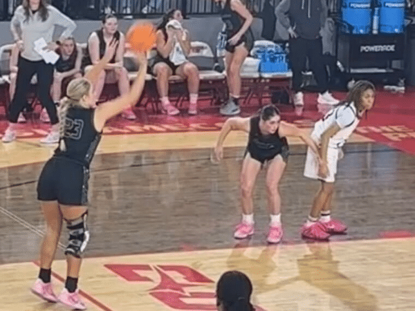 Karma Kilgore shooting a free throw at a basketball game